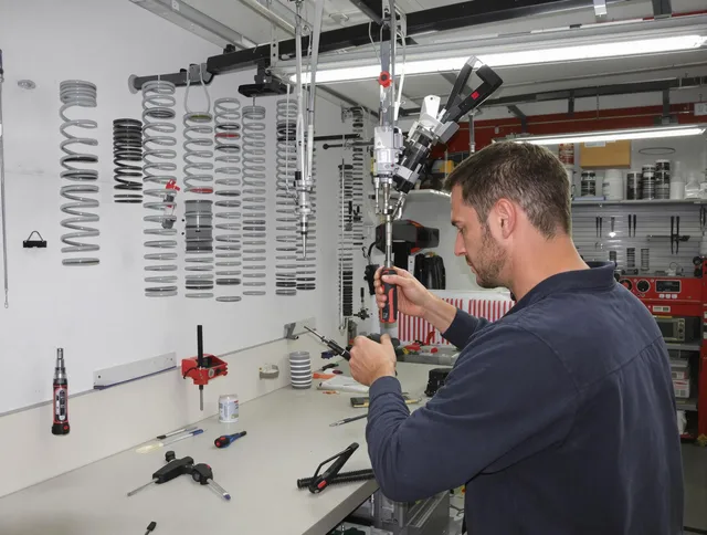 Guilford Garage Door Repair safety certified technician performing precision spring replacement in Guilford