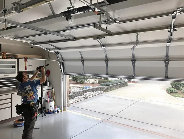 Garage door track repair service by Guilford Garage Door Repair in Guilford